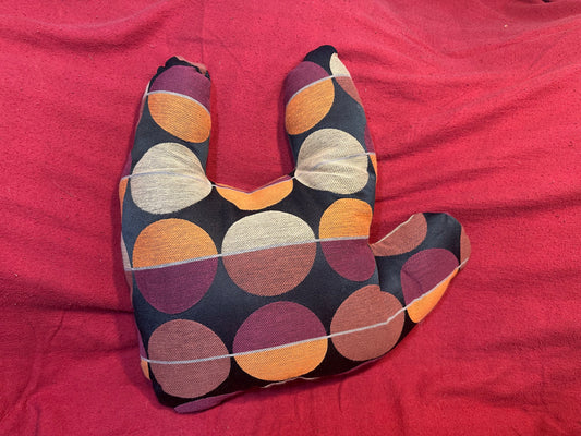 Geometric ‘ILY’ Plush Pillow with Orange, Tan, and Dark Red Circles on Black Background